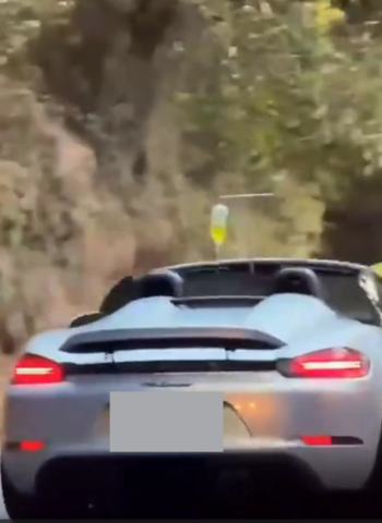 敞篷保時捷掛點滴上路畫面瘋傳　專家提醒用路安全不容忽視